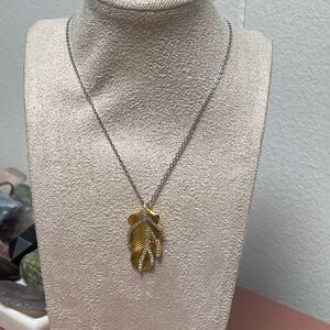 Elegant Gold and Silver Feather Pendant Necklace